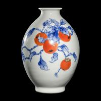 A Japanese Red, Blue, and White 'Persimmon' Porcelain Vase by Makuzu Kozan (1842-1916) 宮川香山製青花柿紋賞瓶