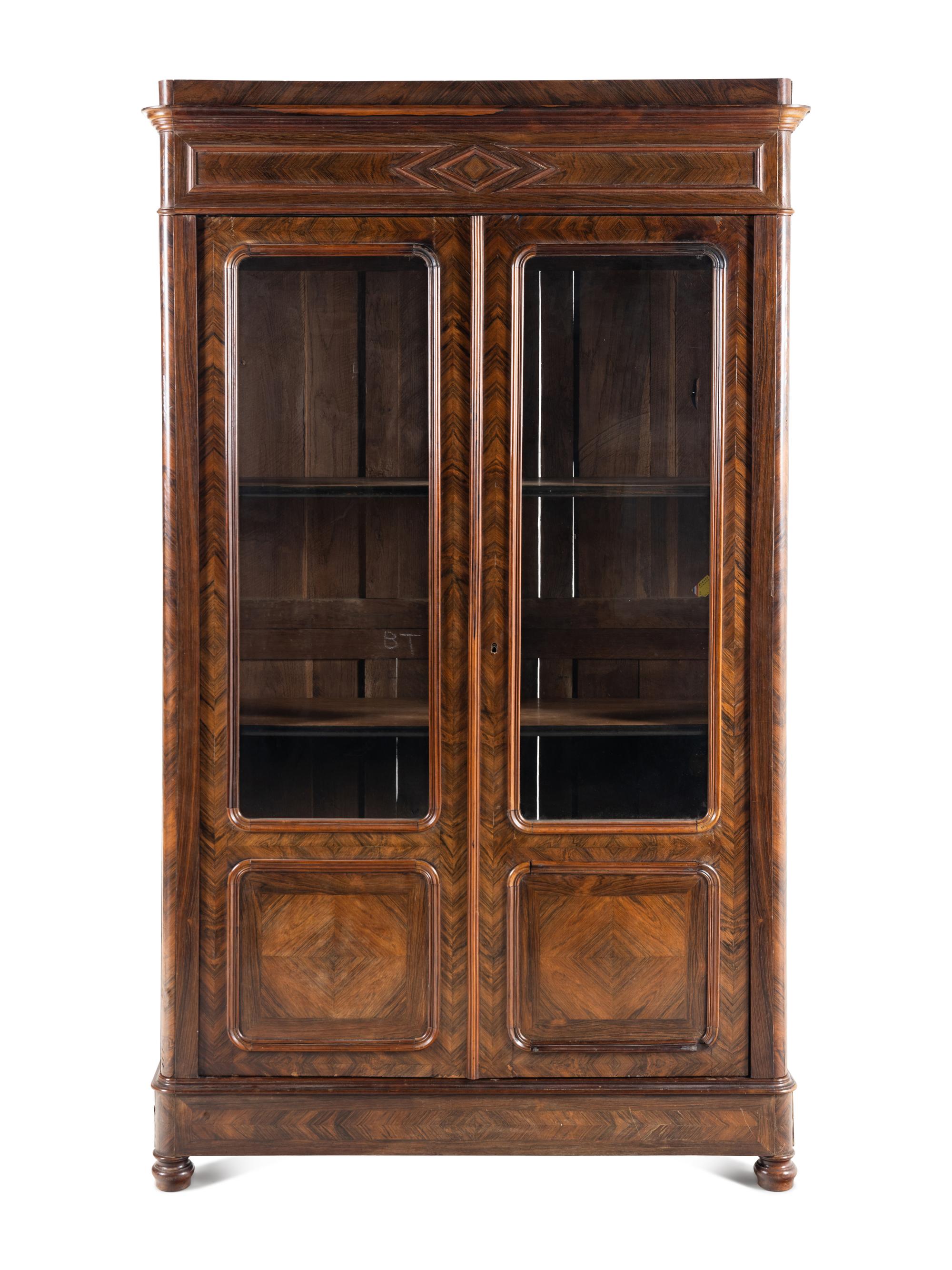 A Continental Walnut Bookcase
