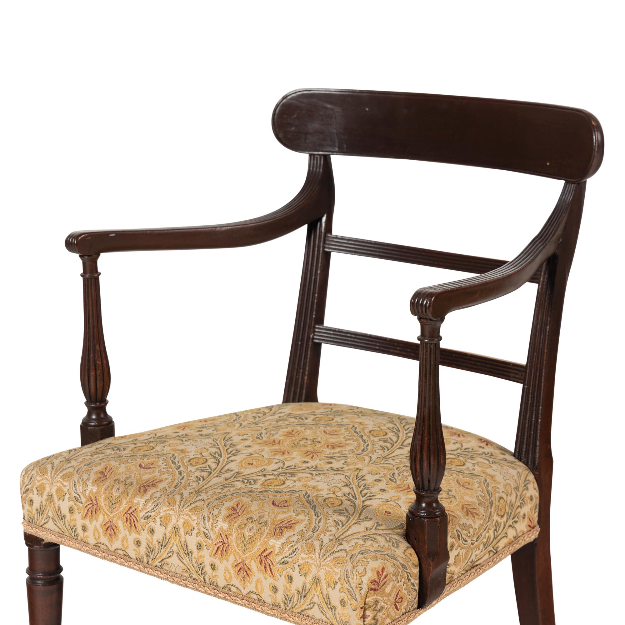 A Set of Eleven George III Mahogany Dining Chairs