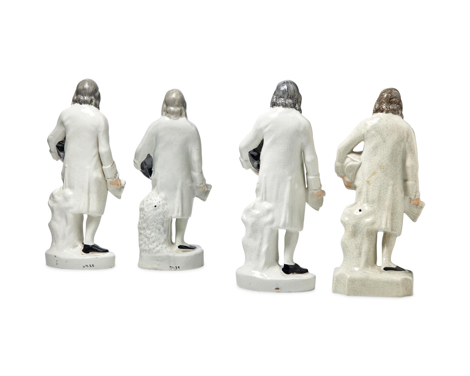 A Group of Four Staffordshire Figures of Benjamin Franklin