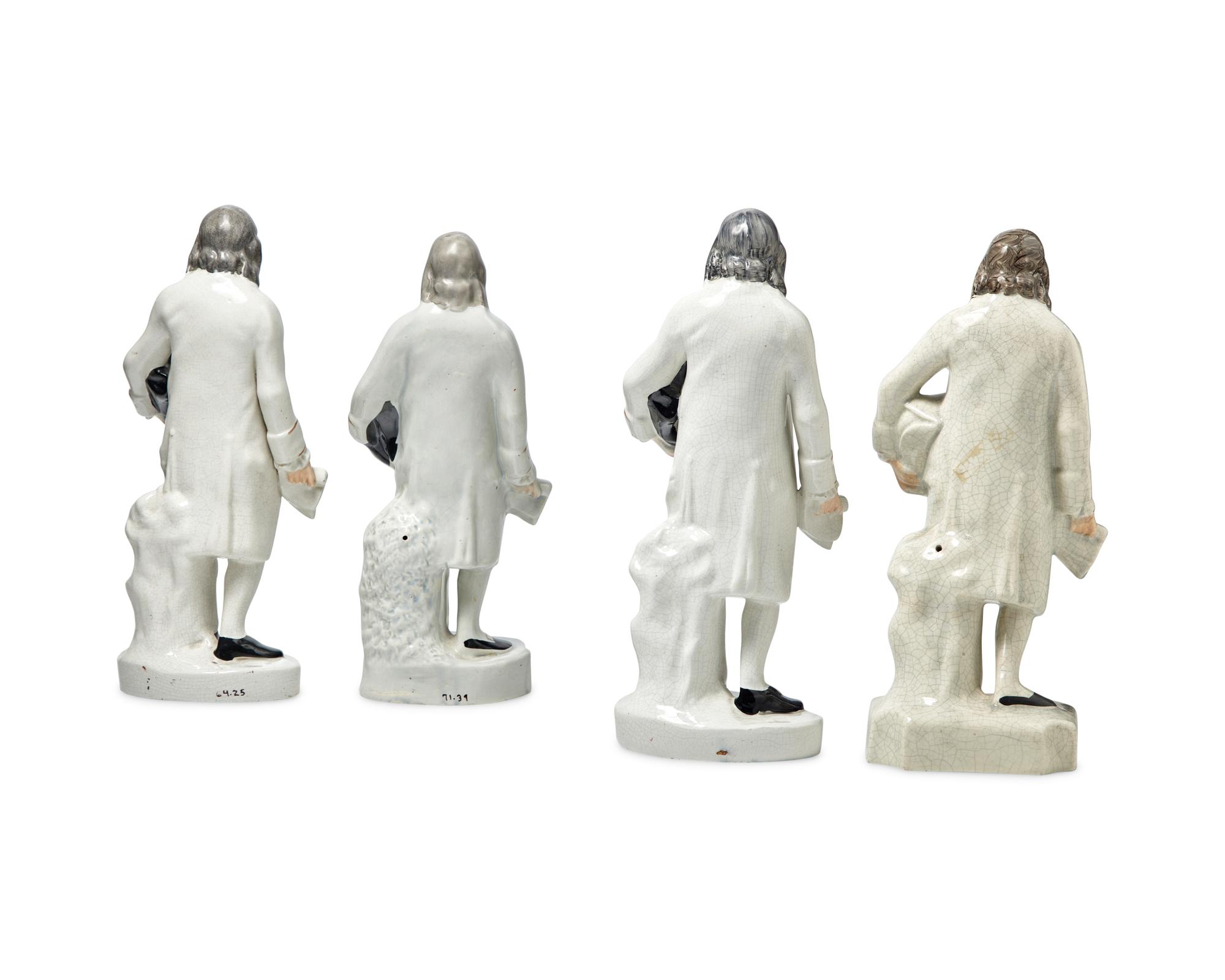 A Group of Four Staffordshire Figures of Benjamin Franklin