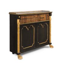 A Regency Black-Painted, Parcel-Gilt and Faux Book Front Cabinet