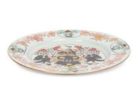A Chinese Export Porcelain Parcel-Gilt Armorial Plate