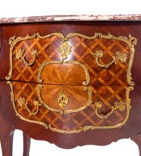 A Louis XV Style Gilt Bronze Mounted Parquetry Marble-Top Commode