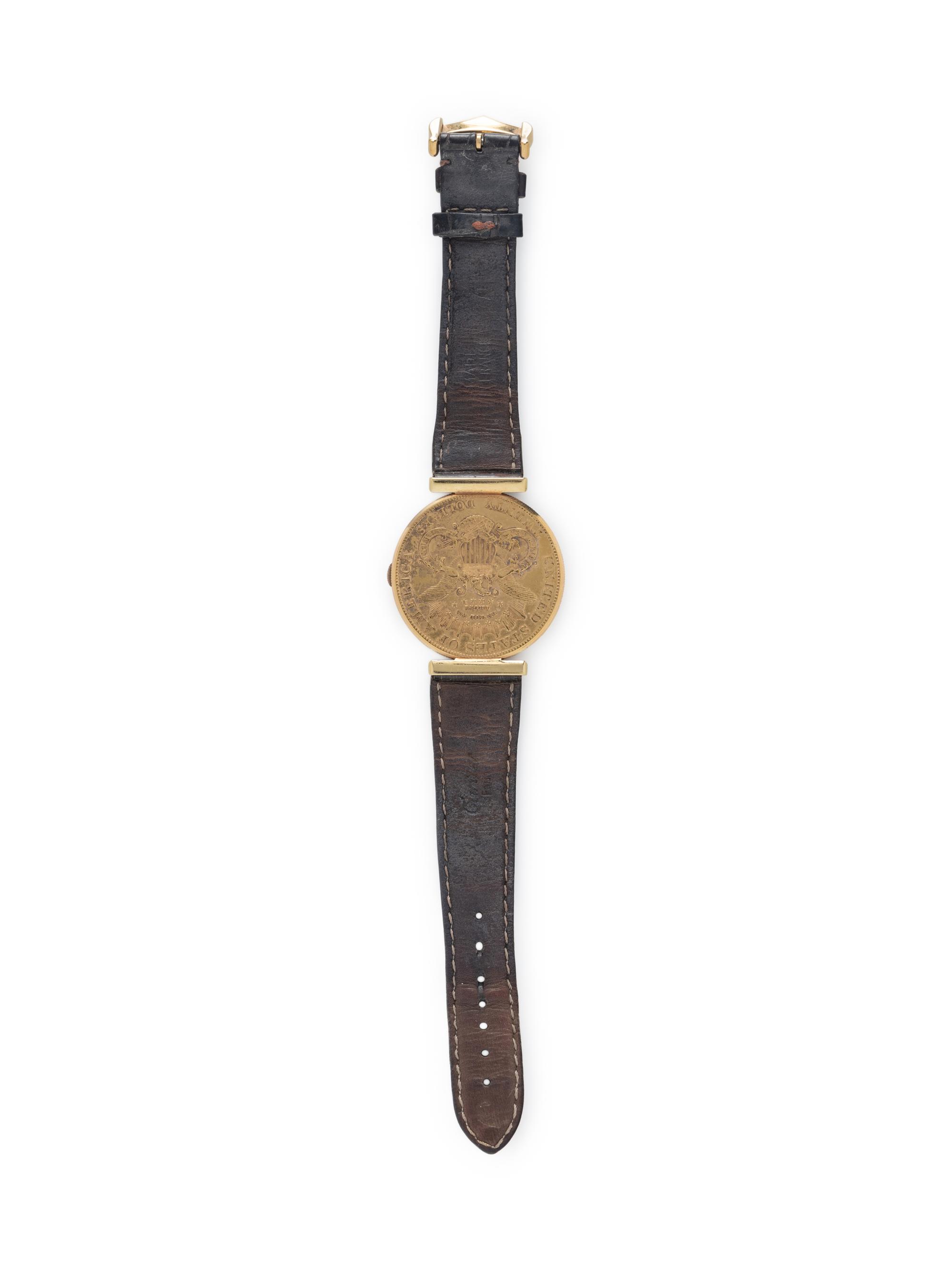 CORUM, 18K YELLOW GOLD HIDDEN DIAL COIN WATCH