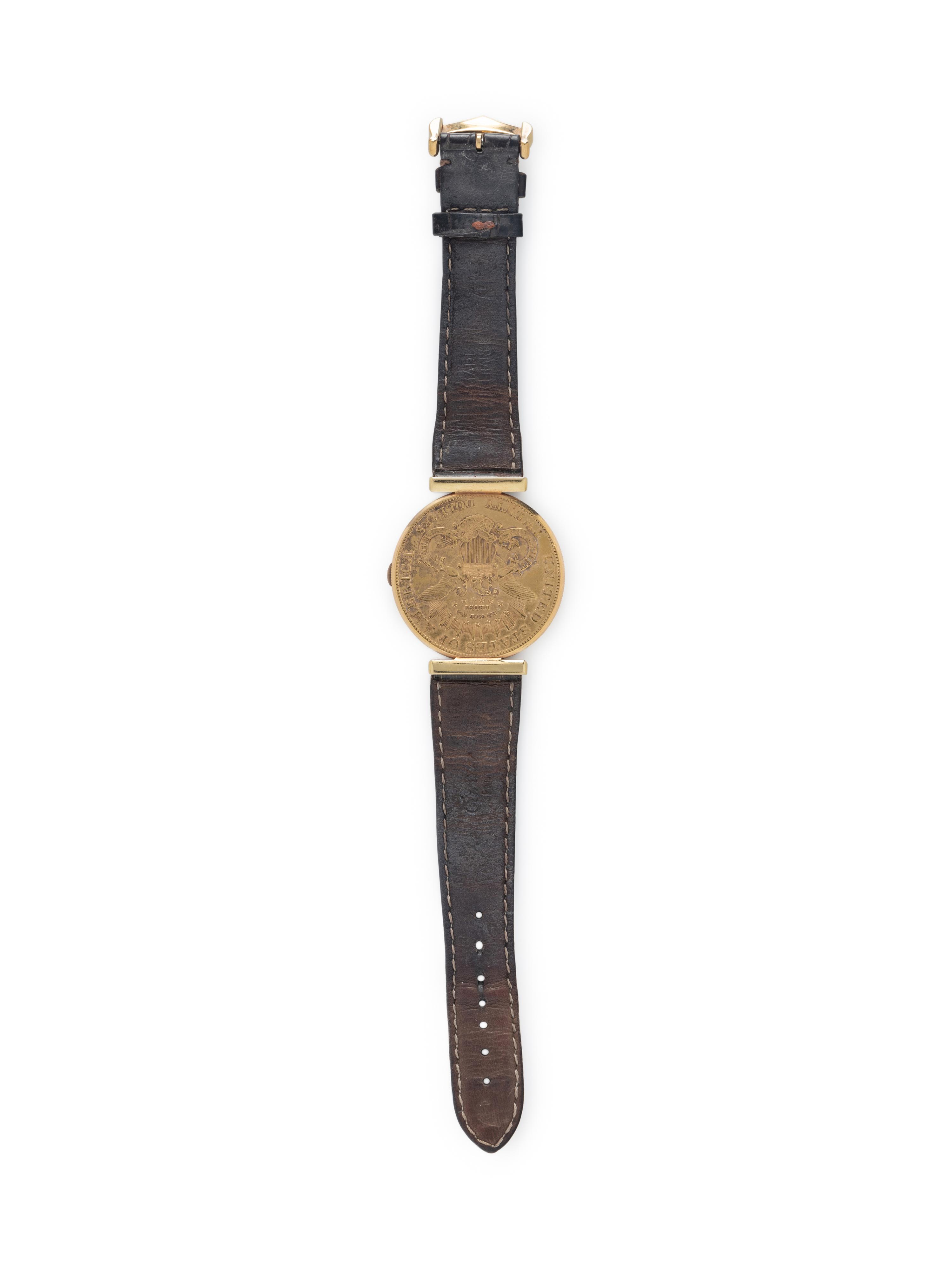 CORUM, 18K YELLOW GOLD HIDDEN DIAL COIN WATCH