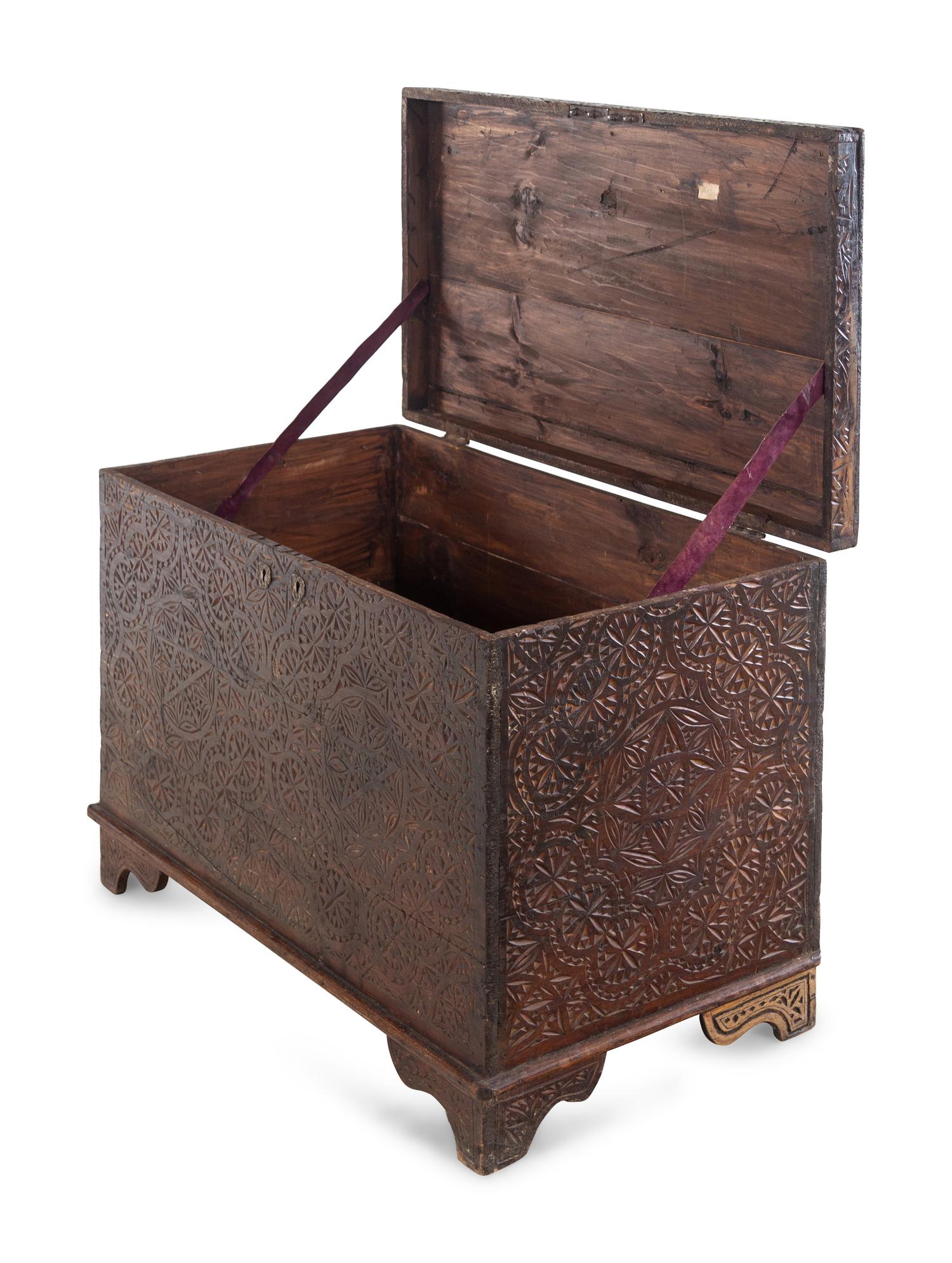 An Anglo-Indian Style Carved Teakwood Trunk
