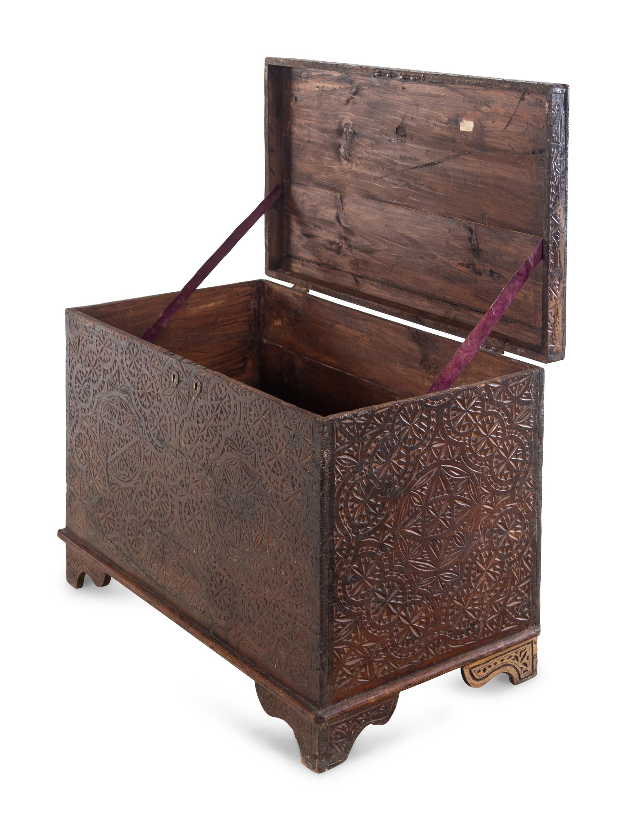 An Anglo-Indian Style Carved Teakwood Trunk