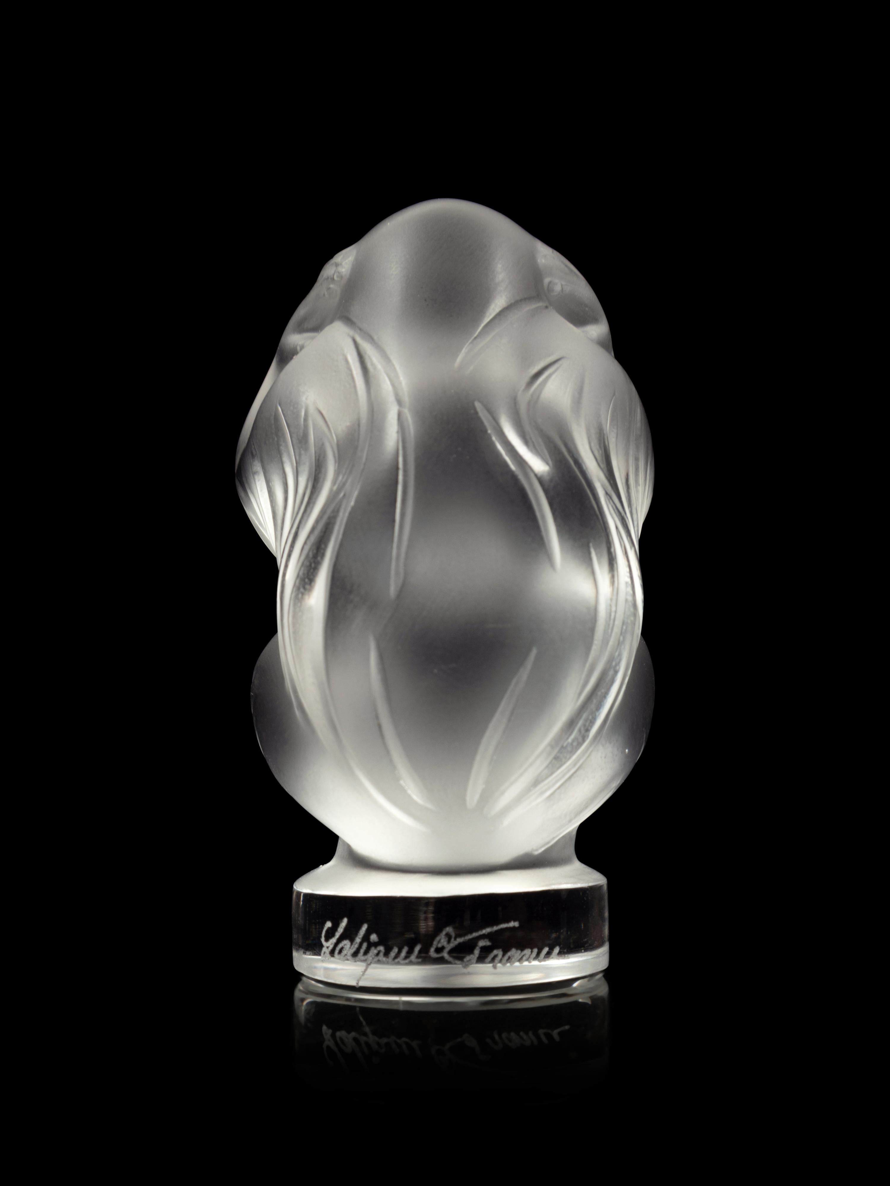 A Set of Three Lalique Sagesse Figures
