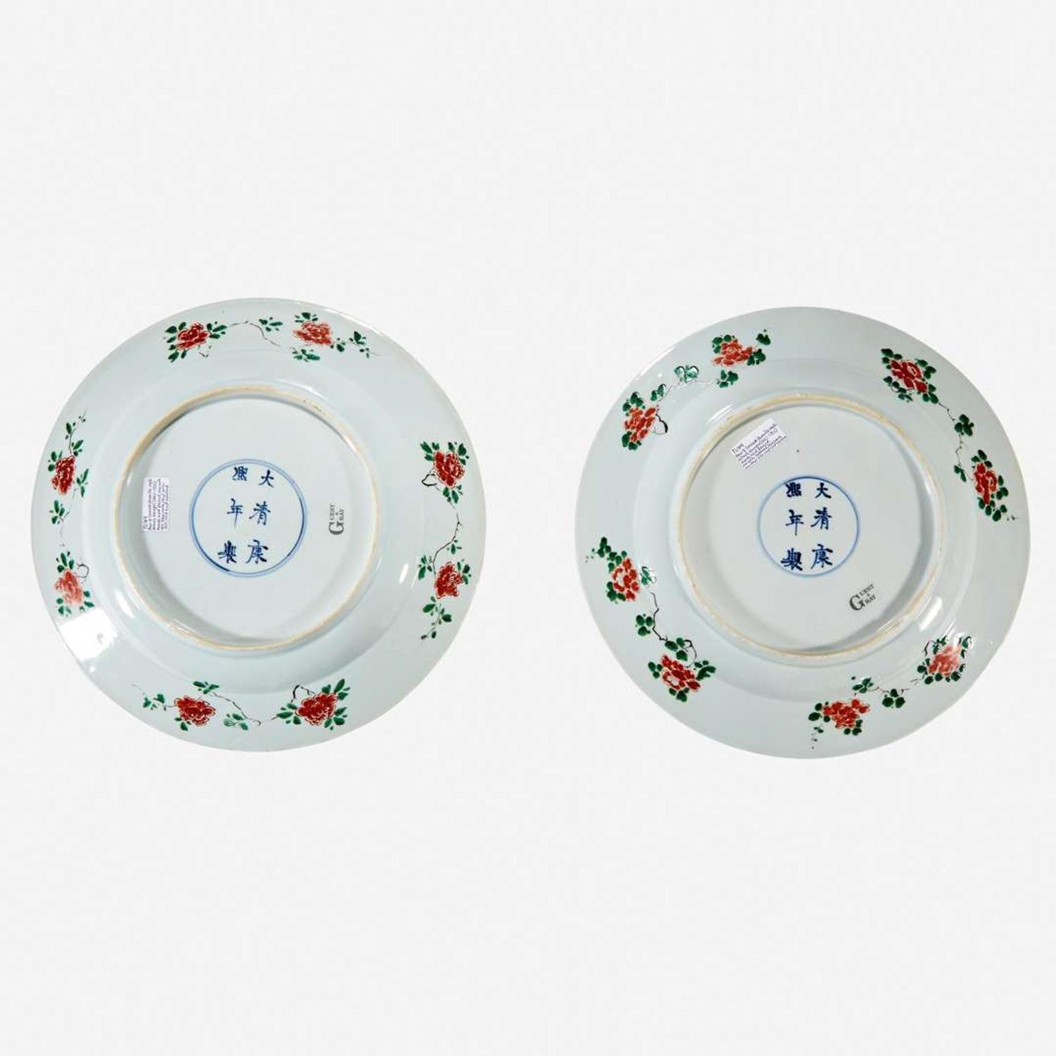 Two similar Chinese famille verte-decorated porcelain “Phoenix and Peony” dishes Kangxi six-character marks and of the period