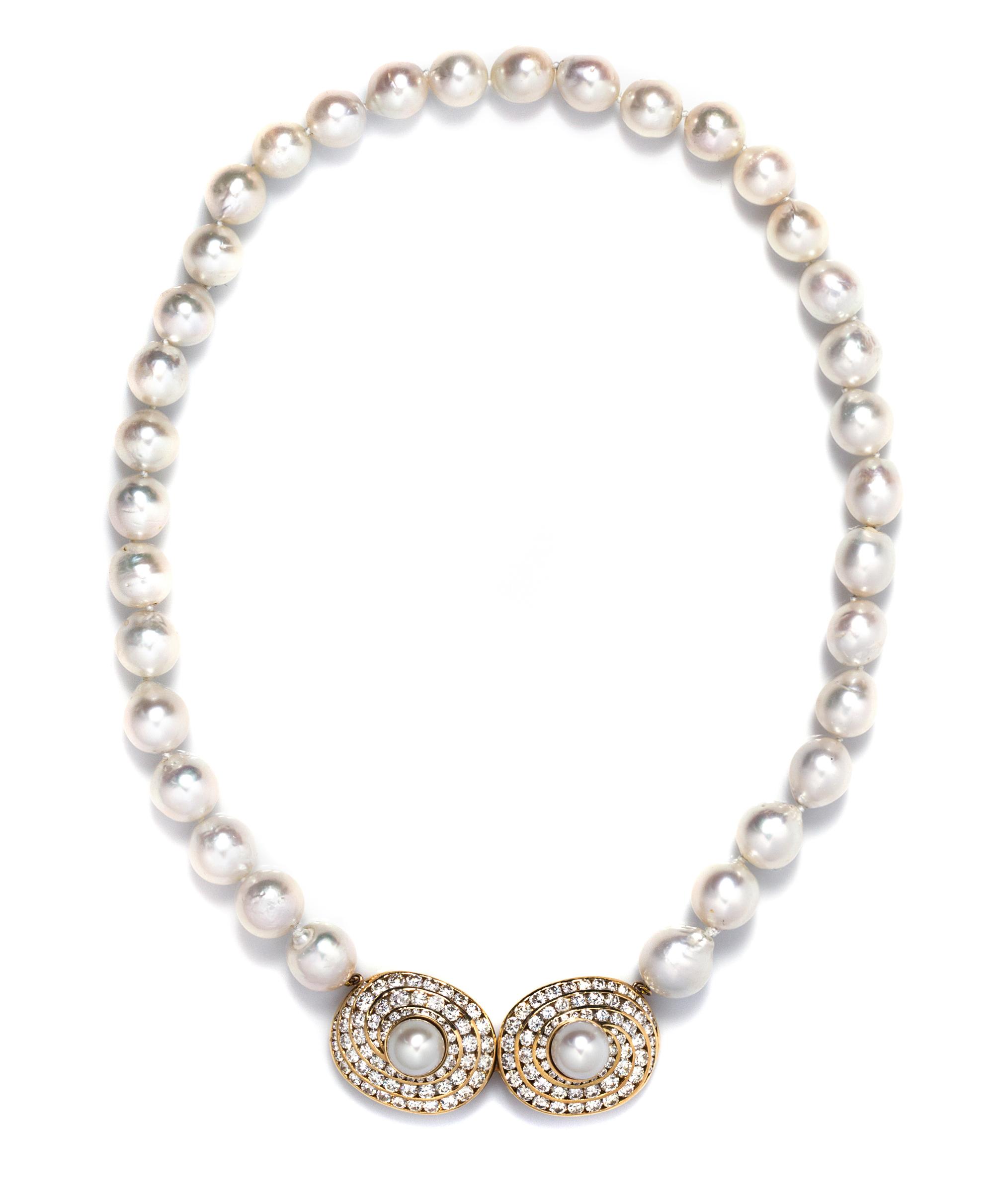 An 18 Karat Yellow Gold, Diamond and Cultured Pearl Necklace, 66.30 dwts.