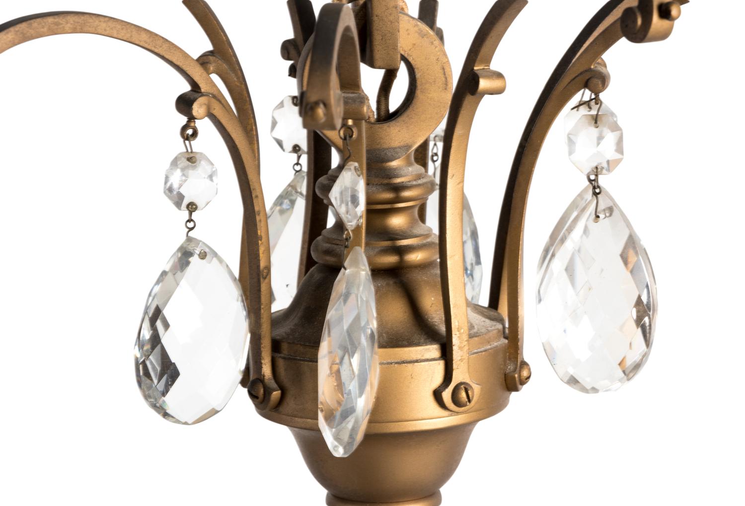A French Gilt Metal and Glass Eight-Light Chandelier