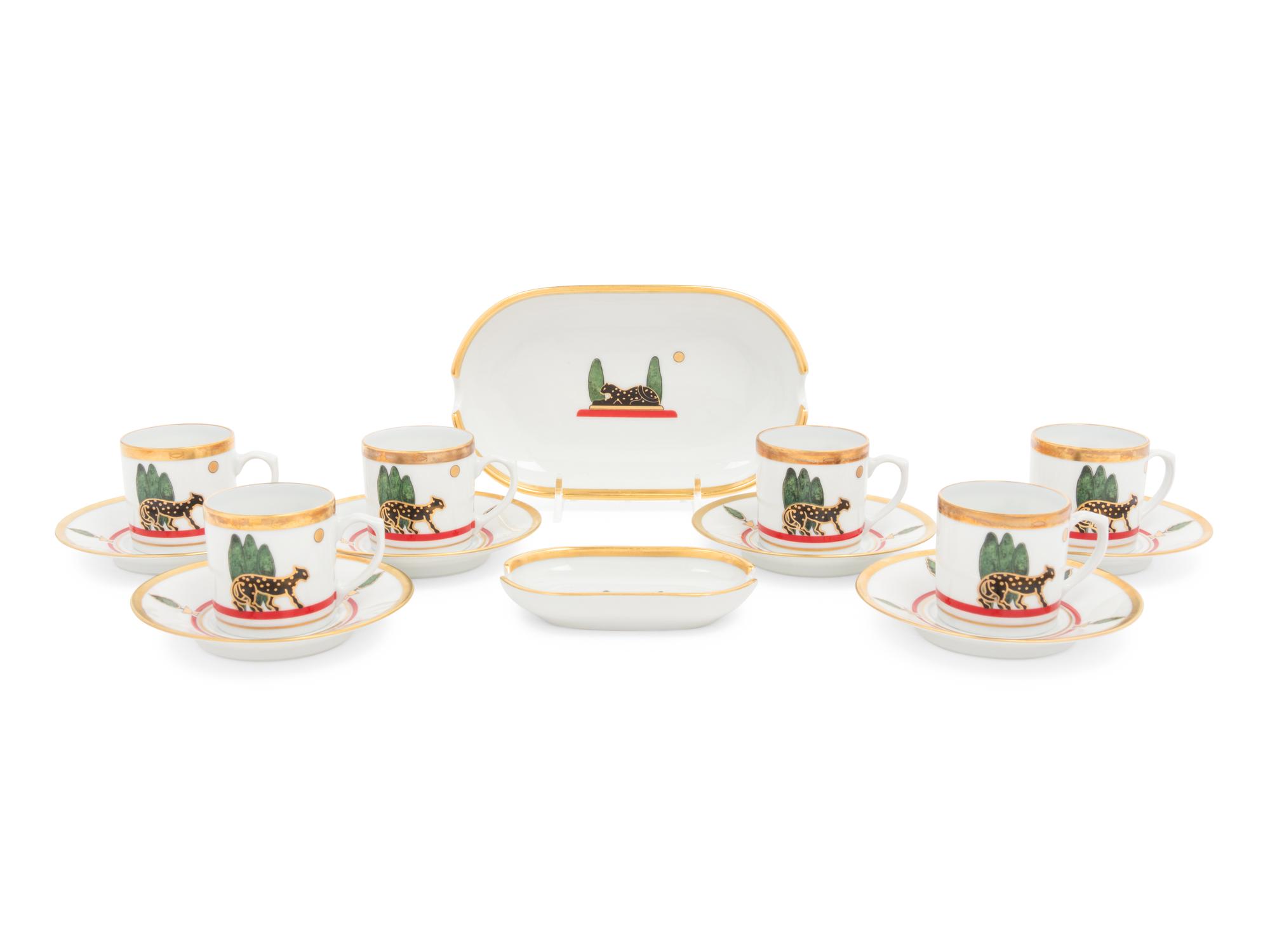 A Set of Six Cartier La Maison de Louis Porcelain Coffee Cups with Saucers