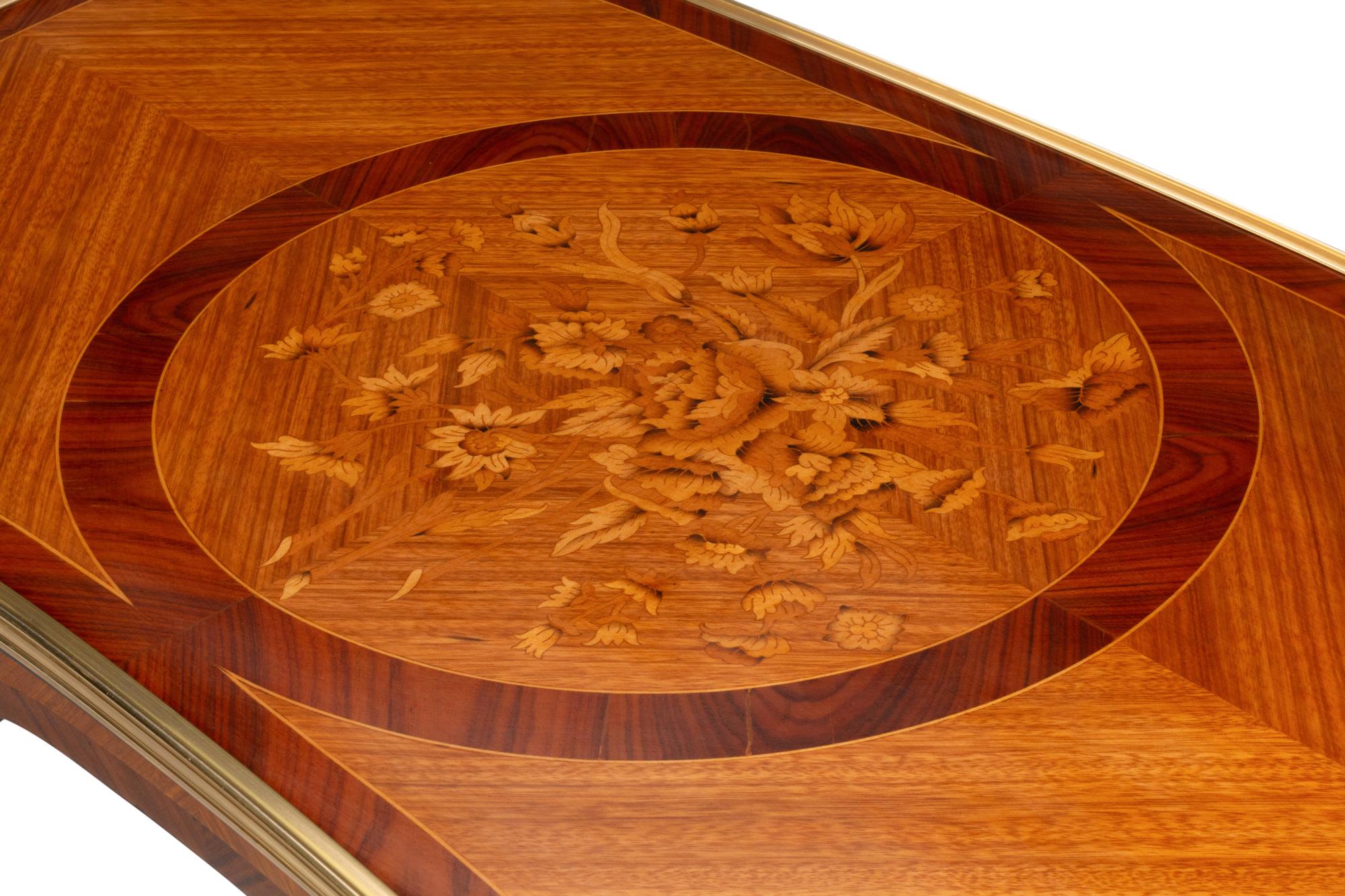 A Pair of Louis XV Style Gilt Bronze Mounted Marquetry Tables