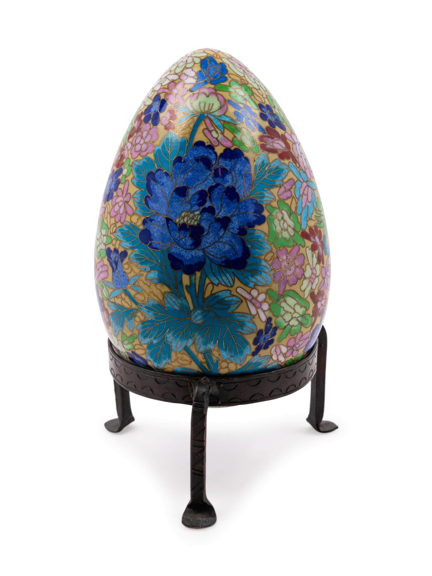 A Continental Cloisonné Enamel Egg with Stand