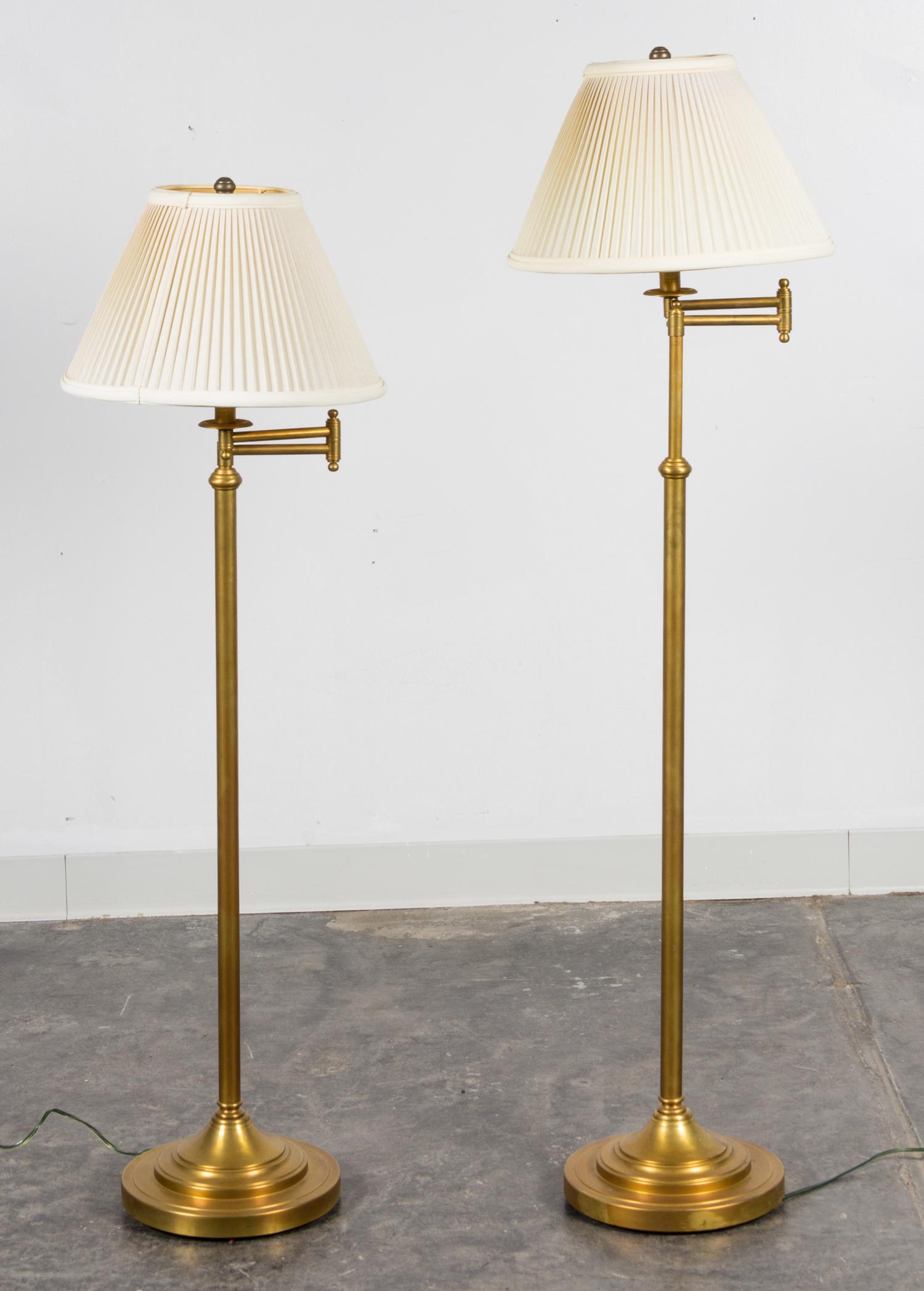 A Pair of Brass Floor Lamps Height of tallest 52 1/2 inches (overall).