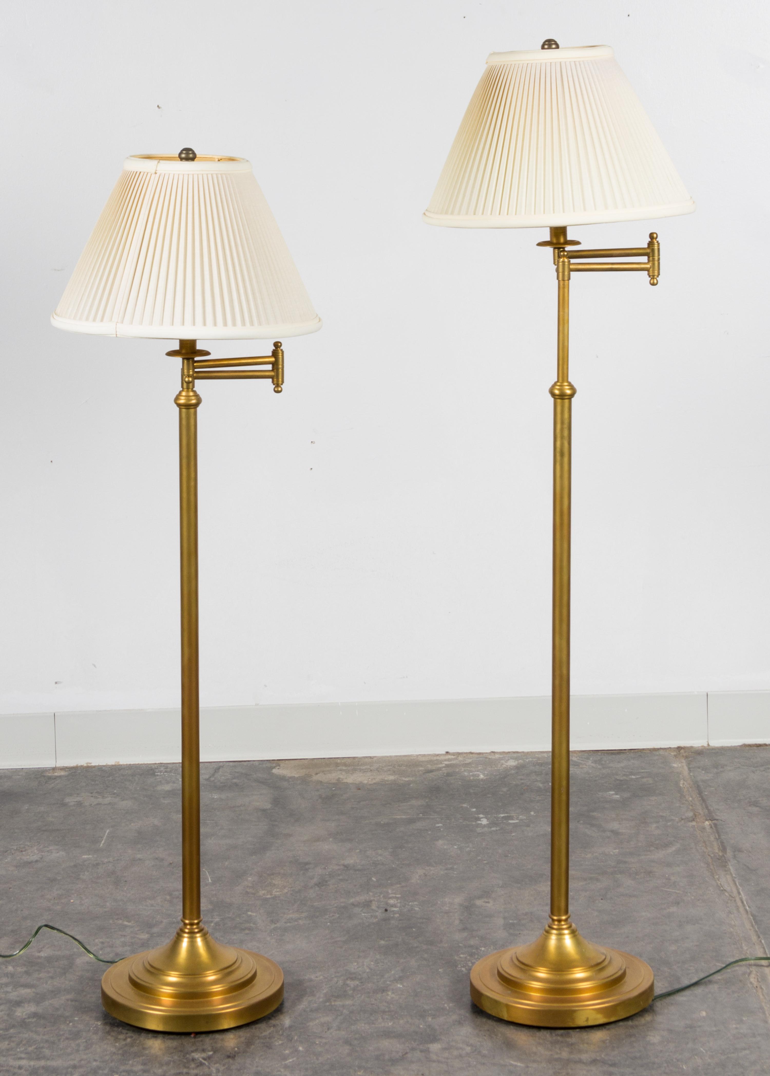 A Pair of Brass Floor Lamps Height of tallest 52 1/2 inches (overall).