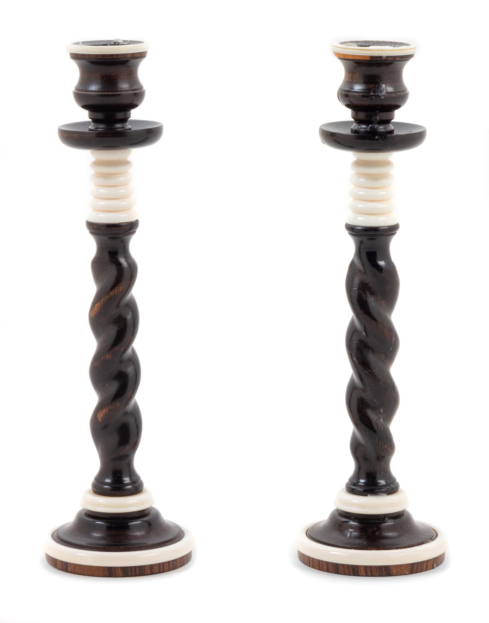 A Pair of Turned Ebony Candlesticks Height 9 1/4 inches. — 19TH CENTURY