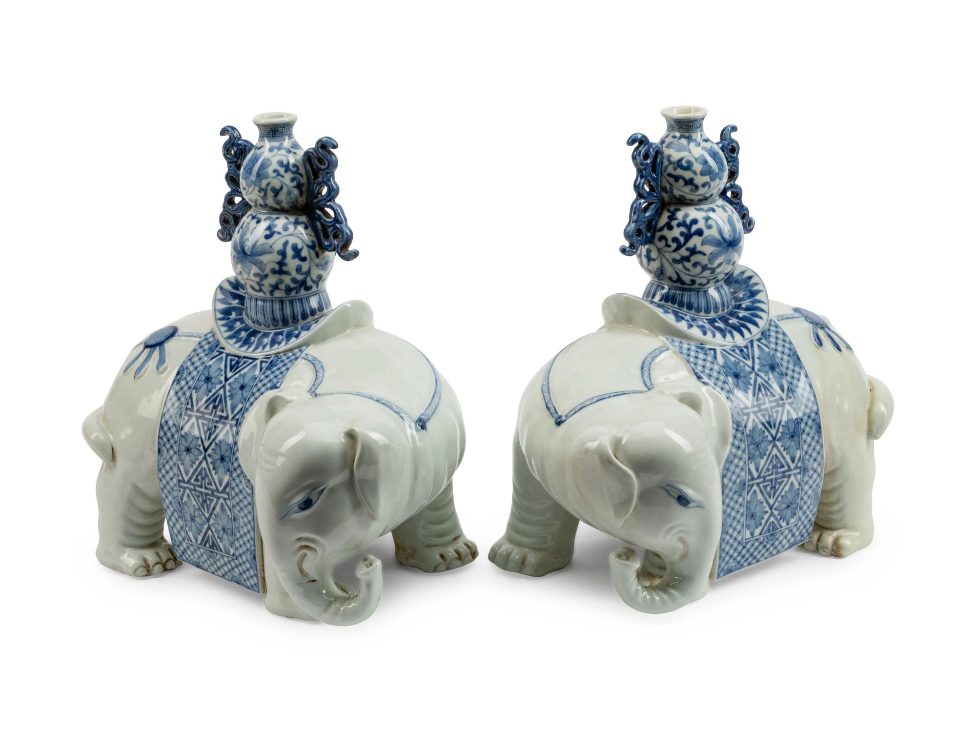 A Pair of Chinese Export Style Porcelain Elephants