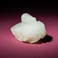 A Chinese White Jade Carving of Double Lotus Pods, 18th/19th Century — 清中期 白玉雙蓮子把件