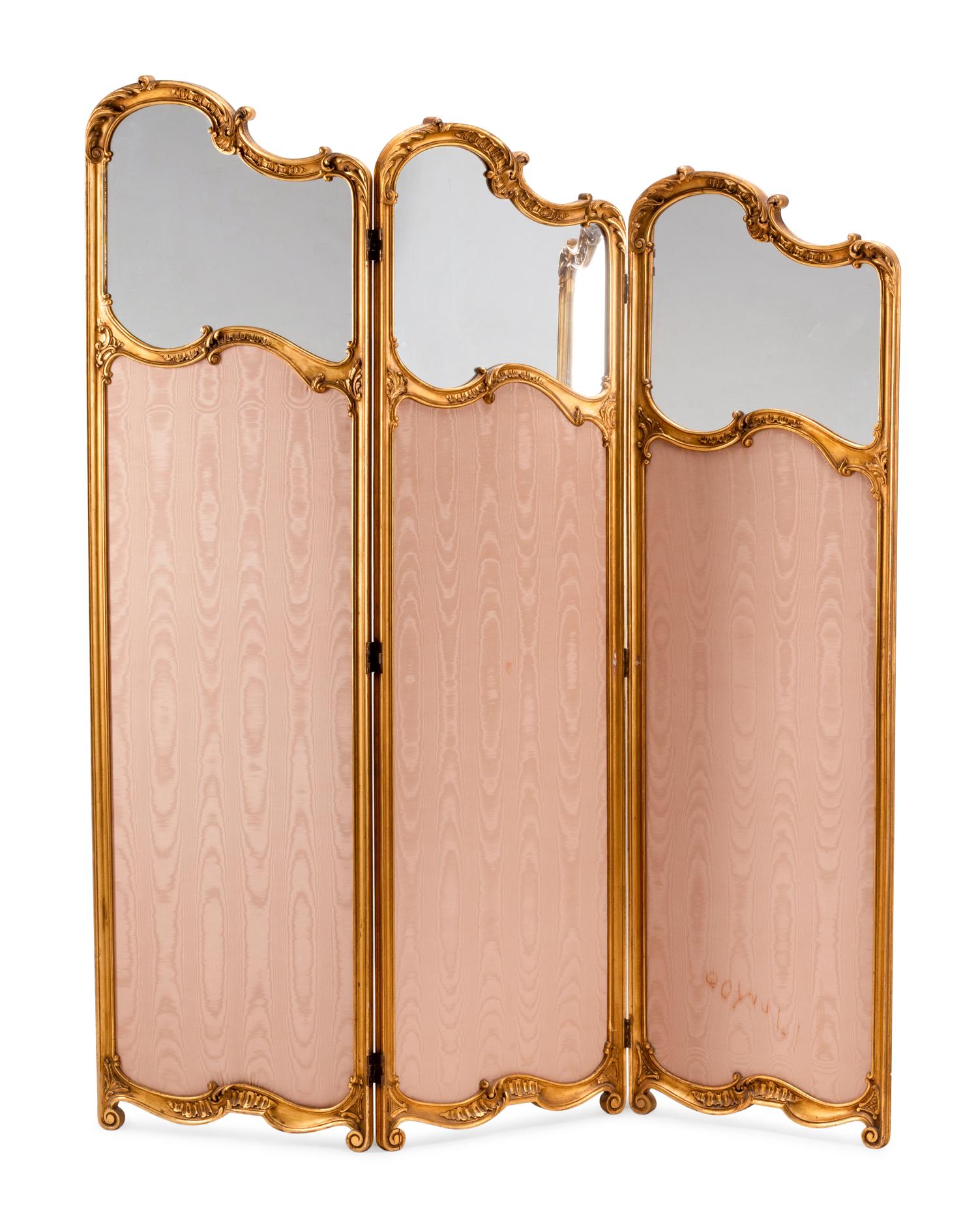 A French Carved Giltwood, Upholstery and Mirror Screen