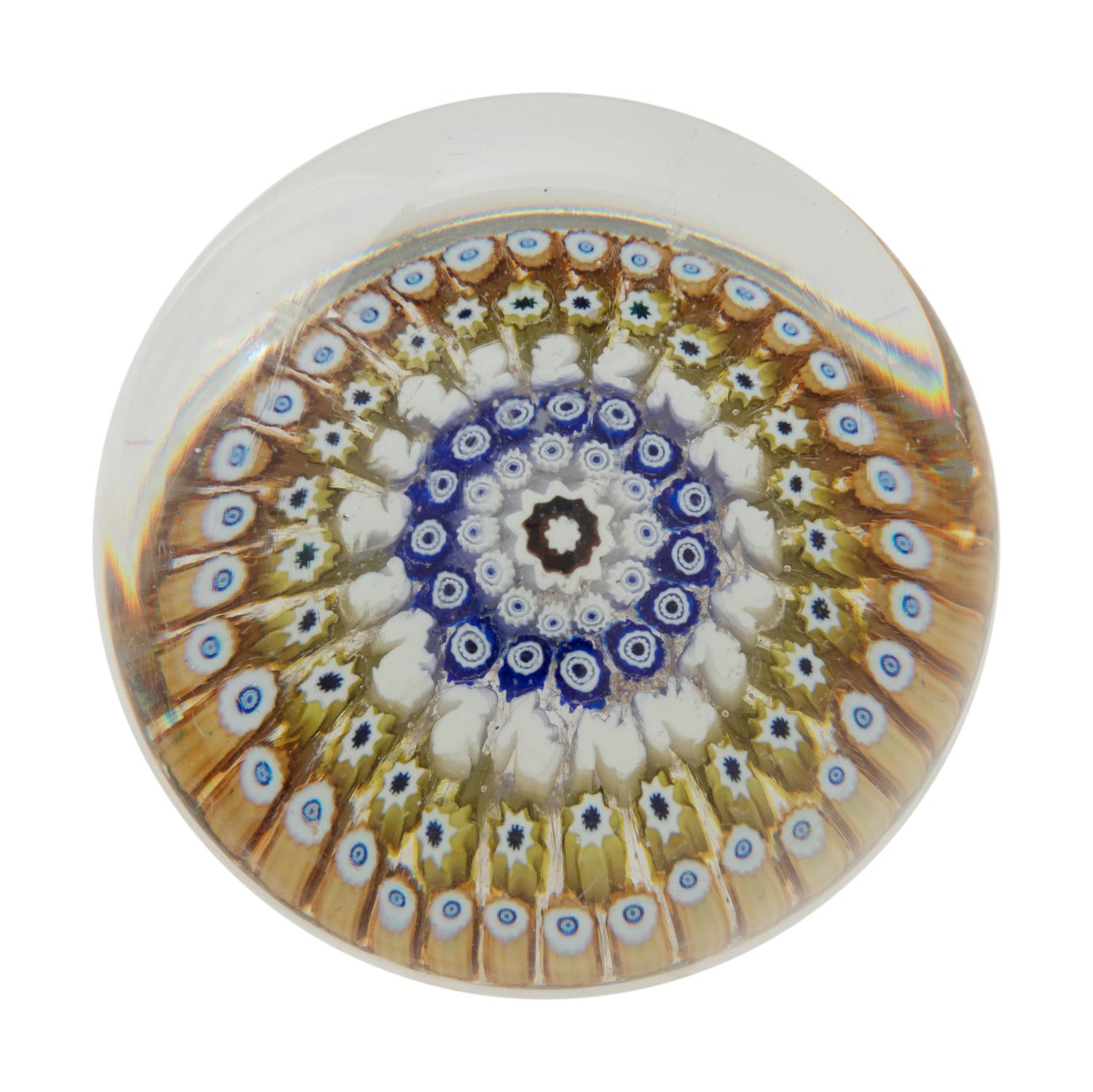 A Concentric Millefiori Rabbit Cane Glass Paperweight