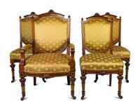 A Continental Parcel Gilt Walnut Four-Piece Seating Suite