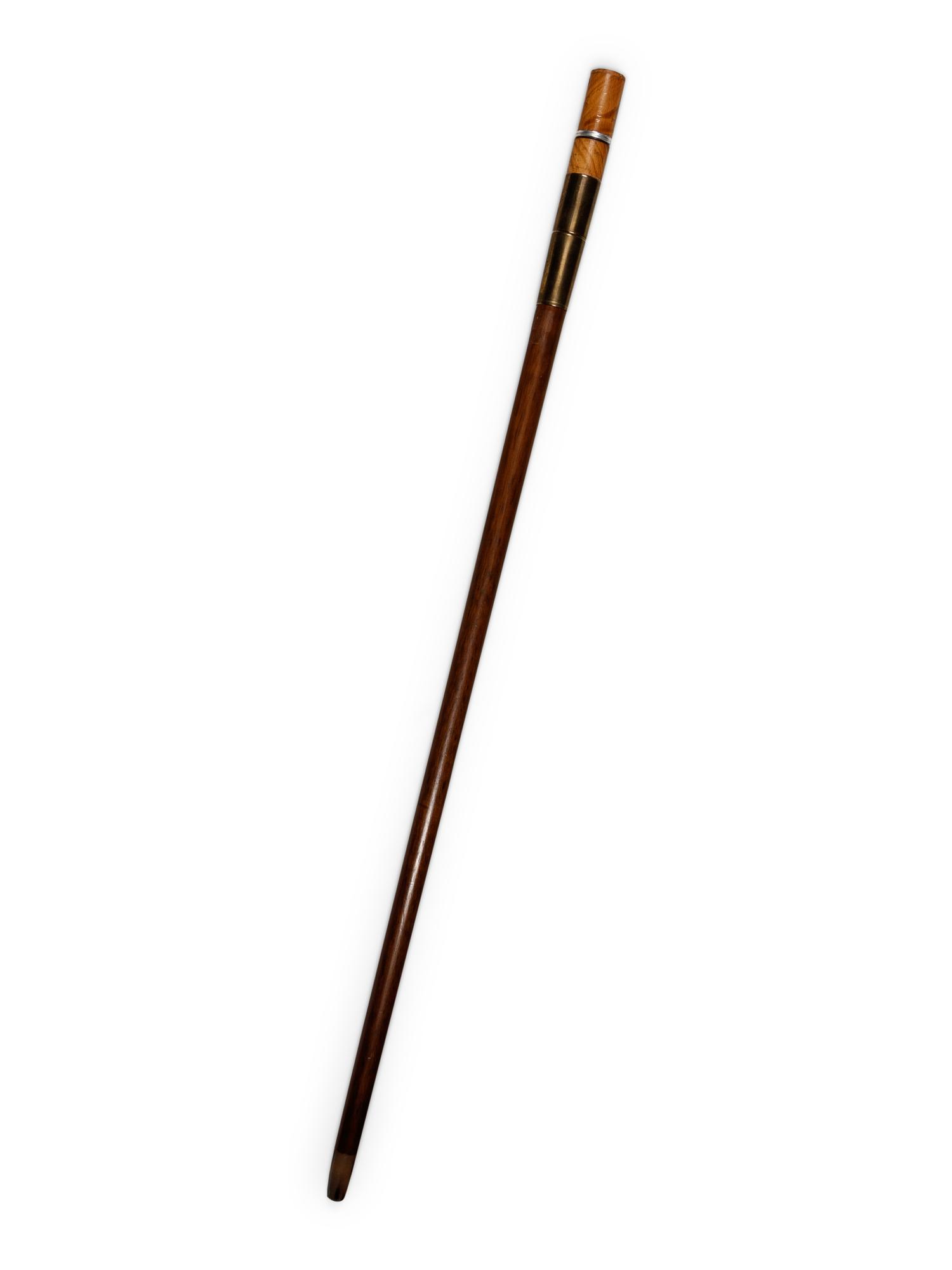 A Brass Mounted Walnut Souvenir Smoker's 'System' Walking Stick
