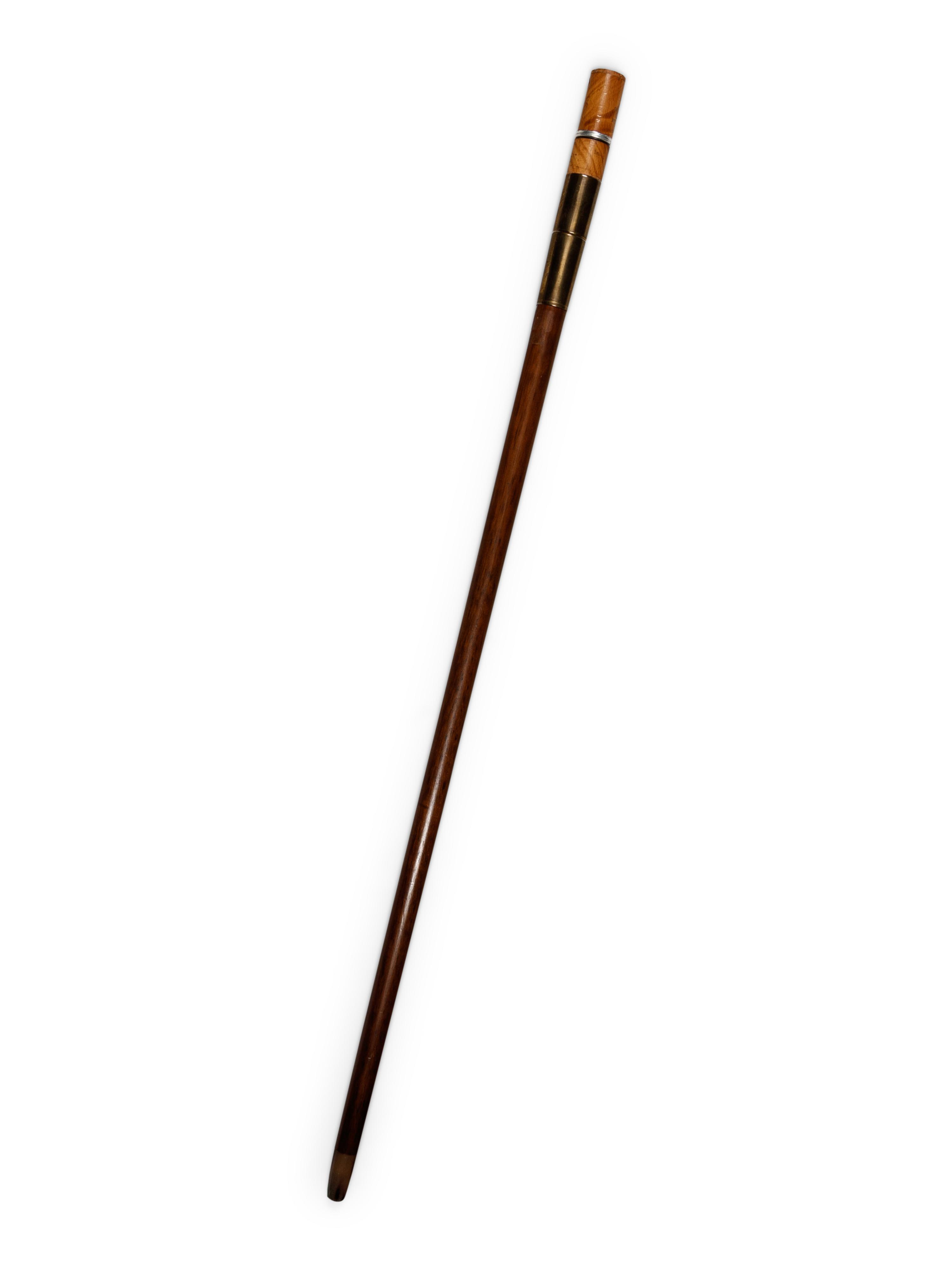 A Brass Mounted Walnut Souvenir Smoker's 'System' Walking Stick
