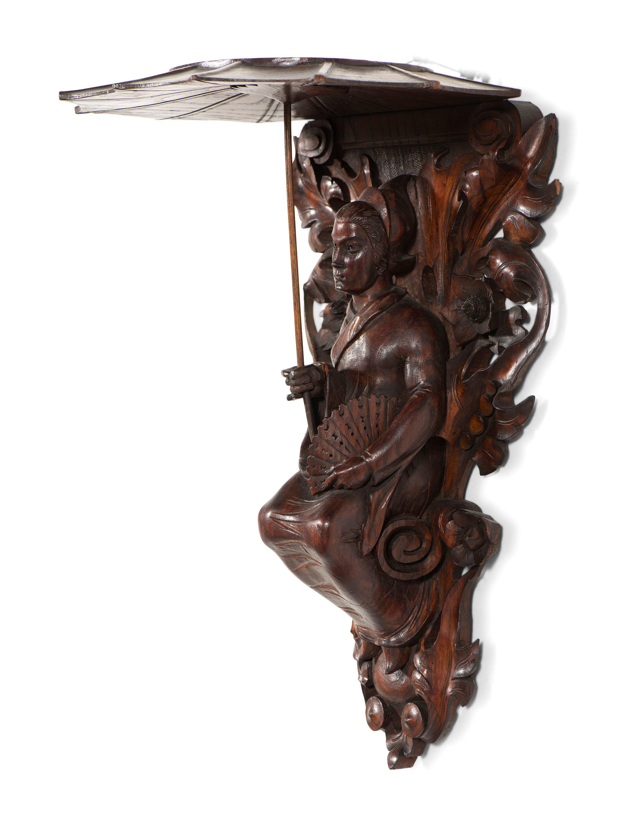 A Pair of Carved Oak Figural Wall Brackets