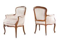 A Pair of Louis XV Style Walnut Bergères