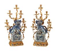 A Pair of Large Gilt Bronze Mounted Porcelain Temple Lion Candelabra