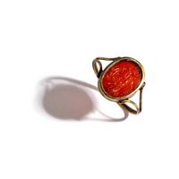 A Neoclassical Carnelian and Gold Finger Ring with a Laurel Branch Offering