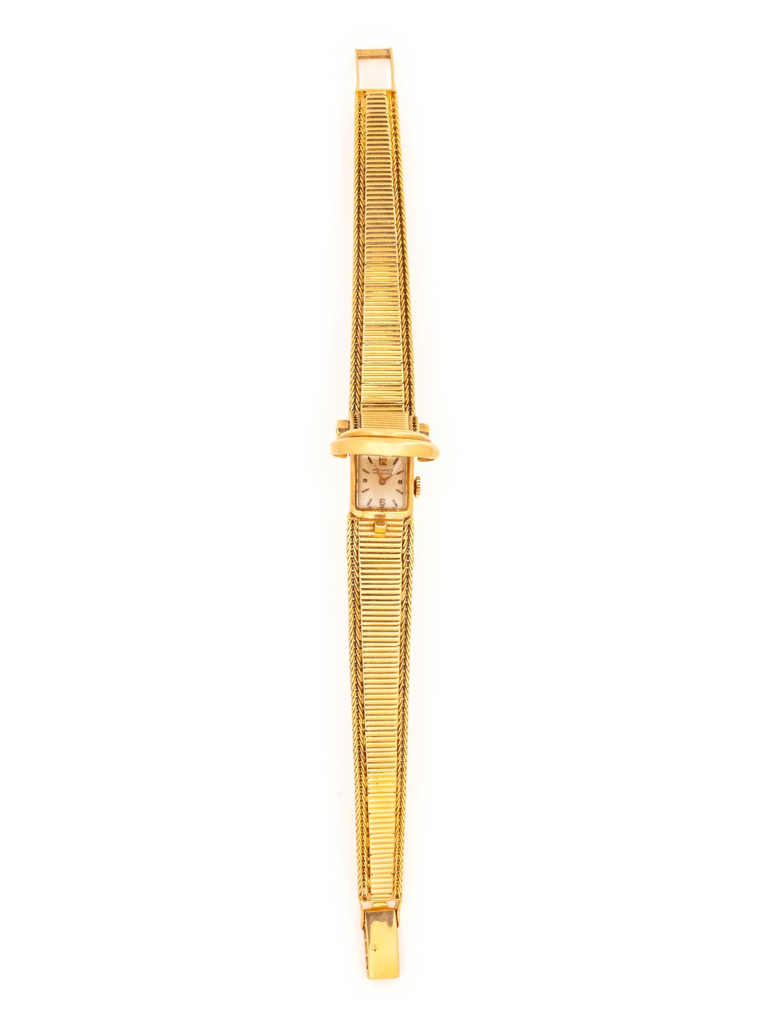 MOVADO, 18K YELLOW GOLD SURPRISE WATCH