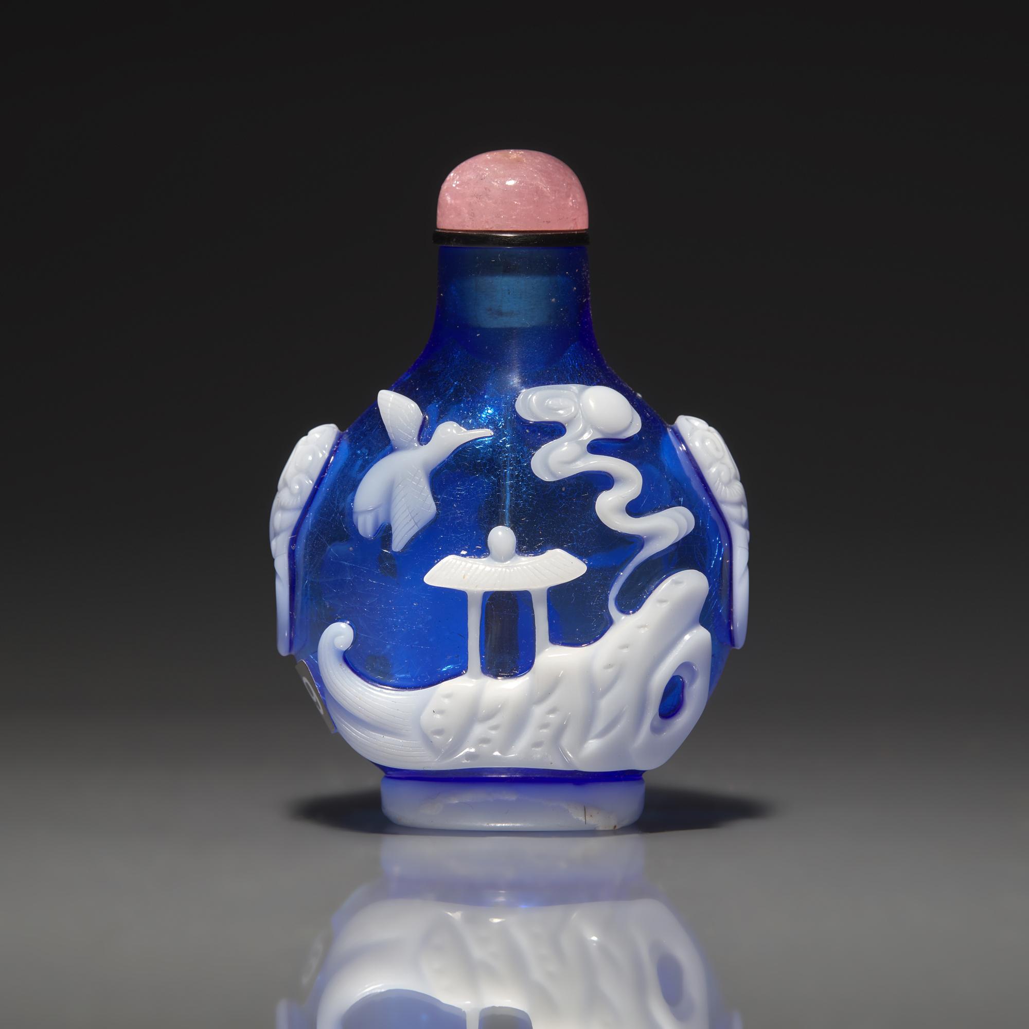 A Chinese White Overlay Blue Glass Snuff Bottle, Qing Dynasty, Possibly 18th-Early 19th Century 清中期 寶石藍地套涅白料垂釣圖鼻烟壺