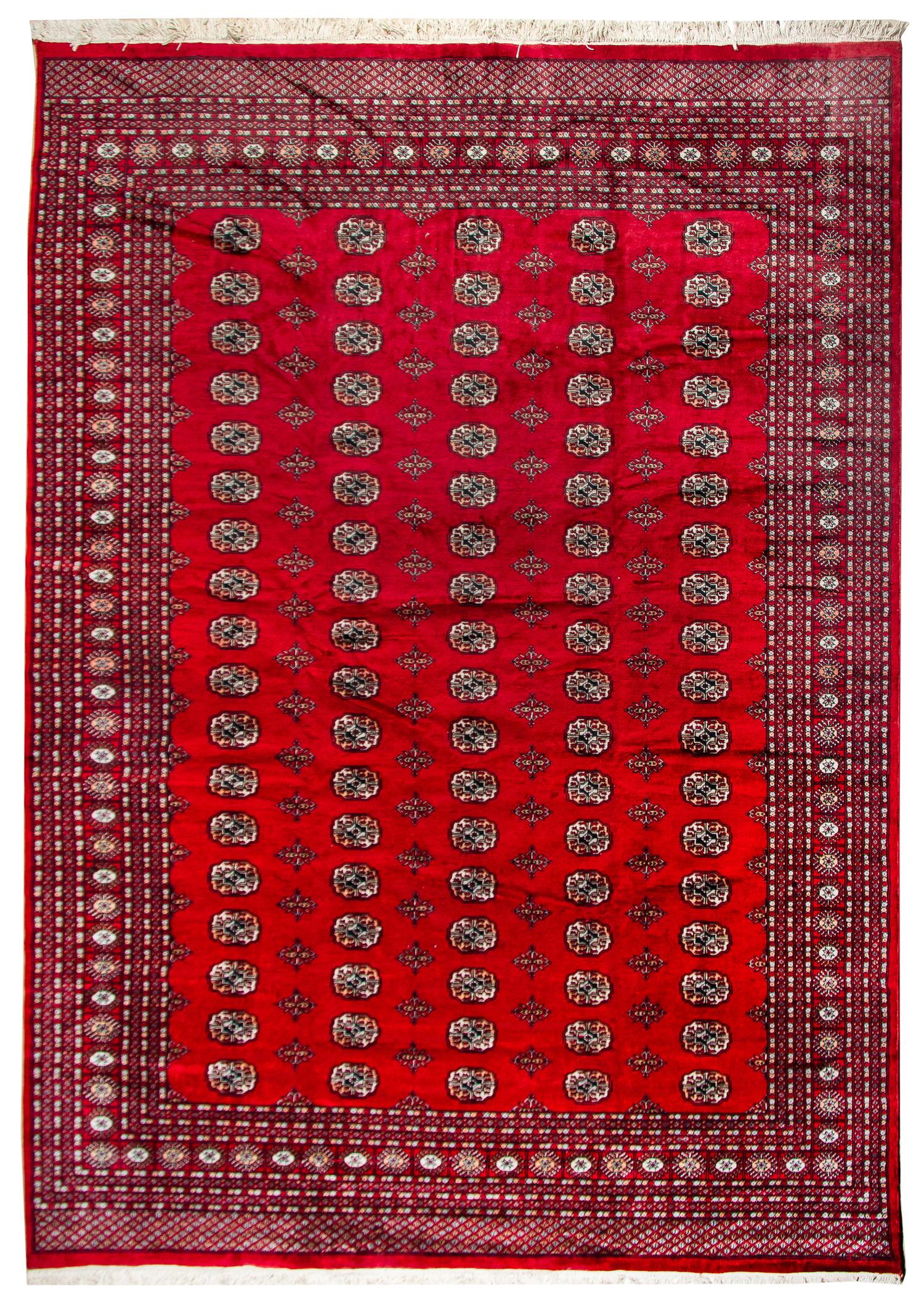 A Bokhara Wool Rug 10 feet 11 inches x 8 feet 3 inches. — SECOND HALF 20TH CENTURY