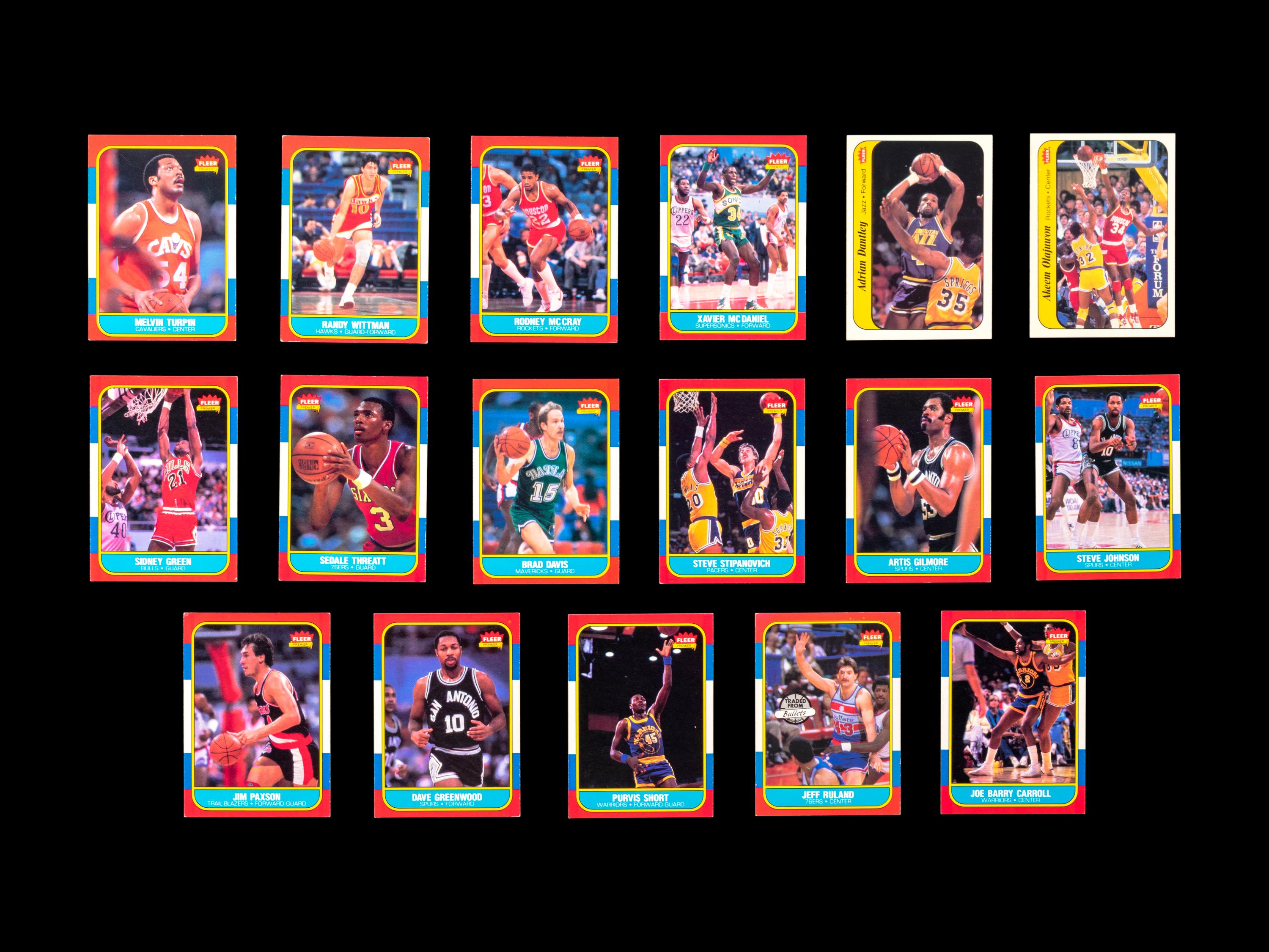 A Group of 71 1986 Fleer Basketball Cards and Stickers (Including Julius Erving, Patrick Ewing, Magic Johnson and Hakeem Olajuwon)