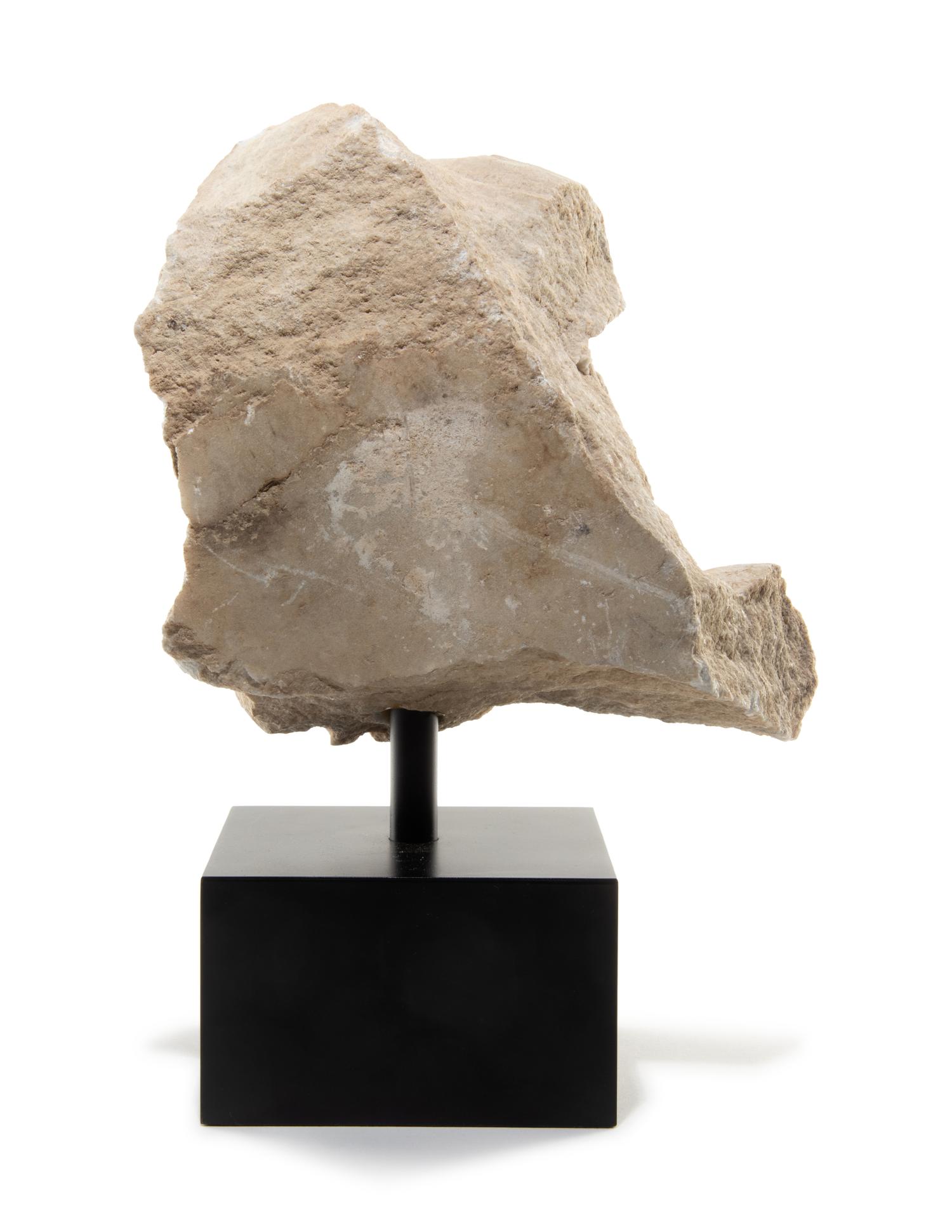 A Roman Marble Bearded Head, Perhaps a Giant, from a Relief