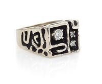 A 14 Karat White Gold and Diamond Ring, 9.00 dwts.