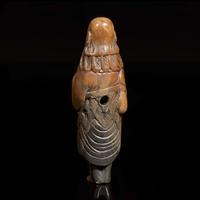 A Chinese carved brown and grey soapstone "Sennin" netsuke 中國壽山石“仙人”根付 18th/ early 19th century ????????