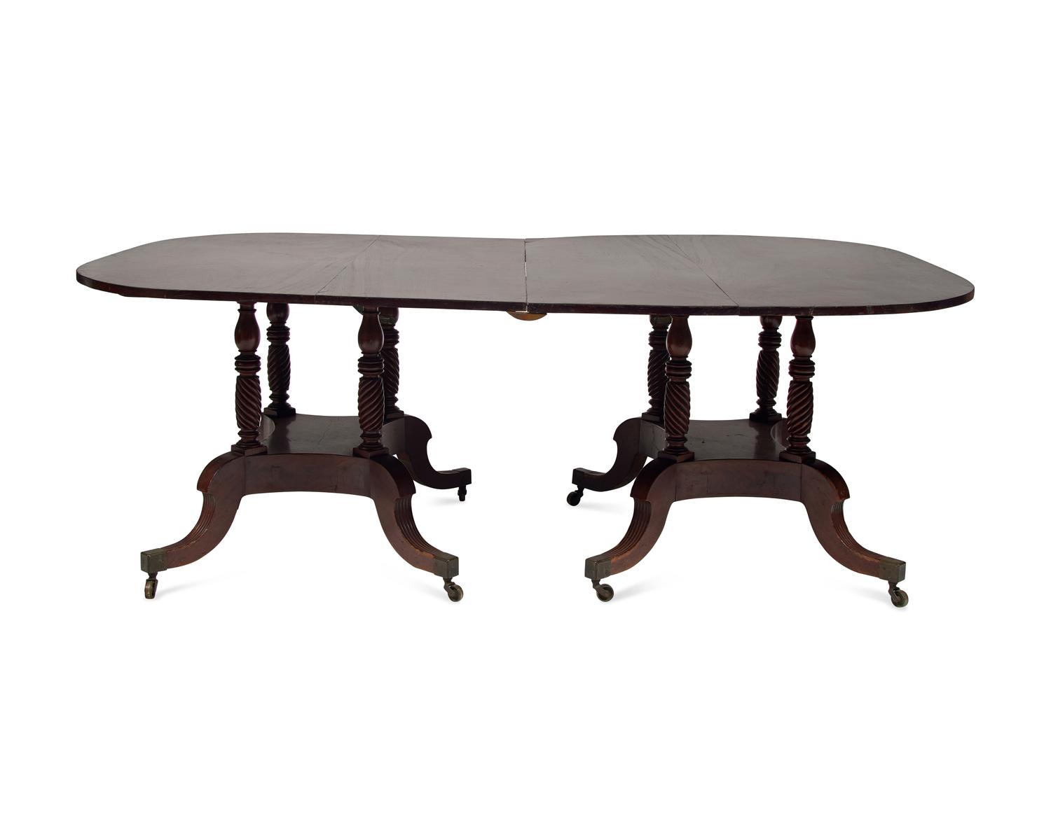 A Late Federal Two-Part Carved Mahogany Dining Table