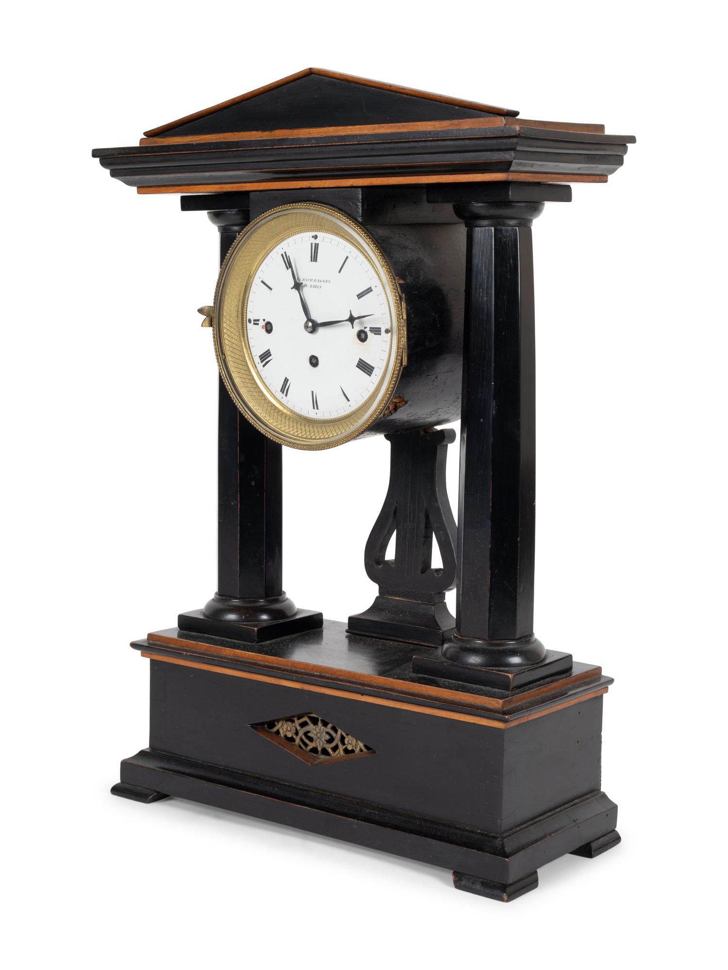 A German Ebonized Cherrywood and Gilt Bronze Mounted Architectural Mantel Clock