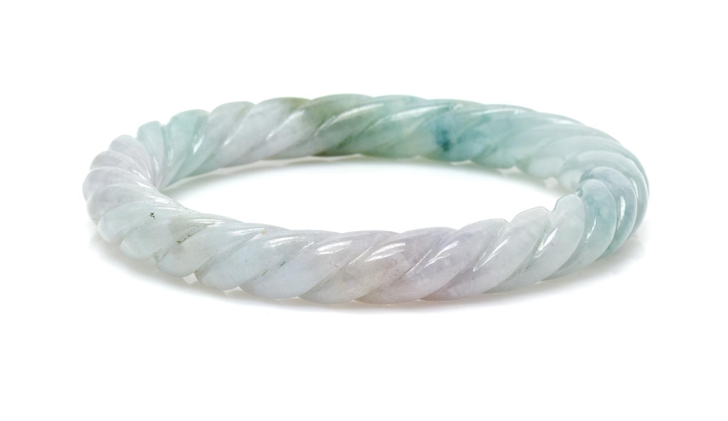 A Carved Jadeite Jade Bangle,