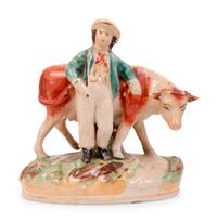 A Group of Eight Staffordshire Pottery Figures