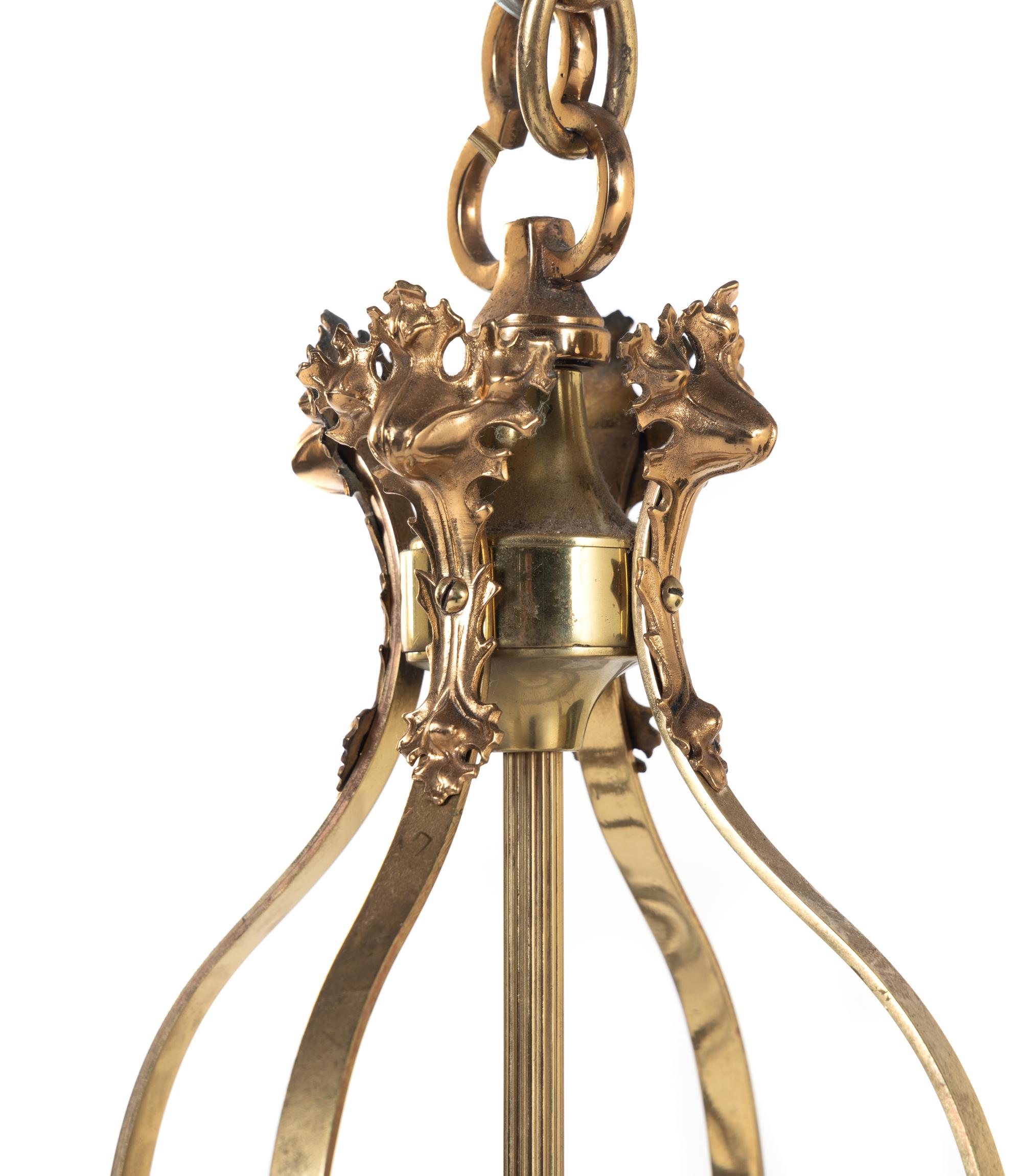 A Set of Four Gothic Style Brass Hall Lanterns
