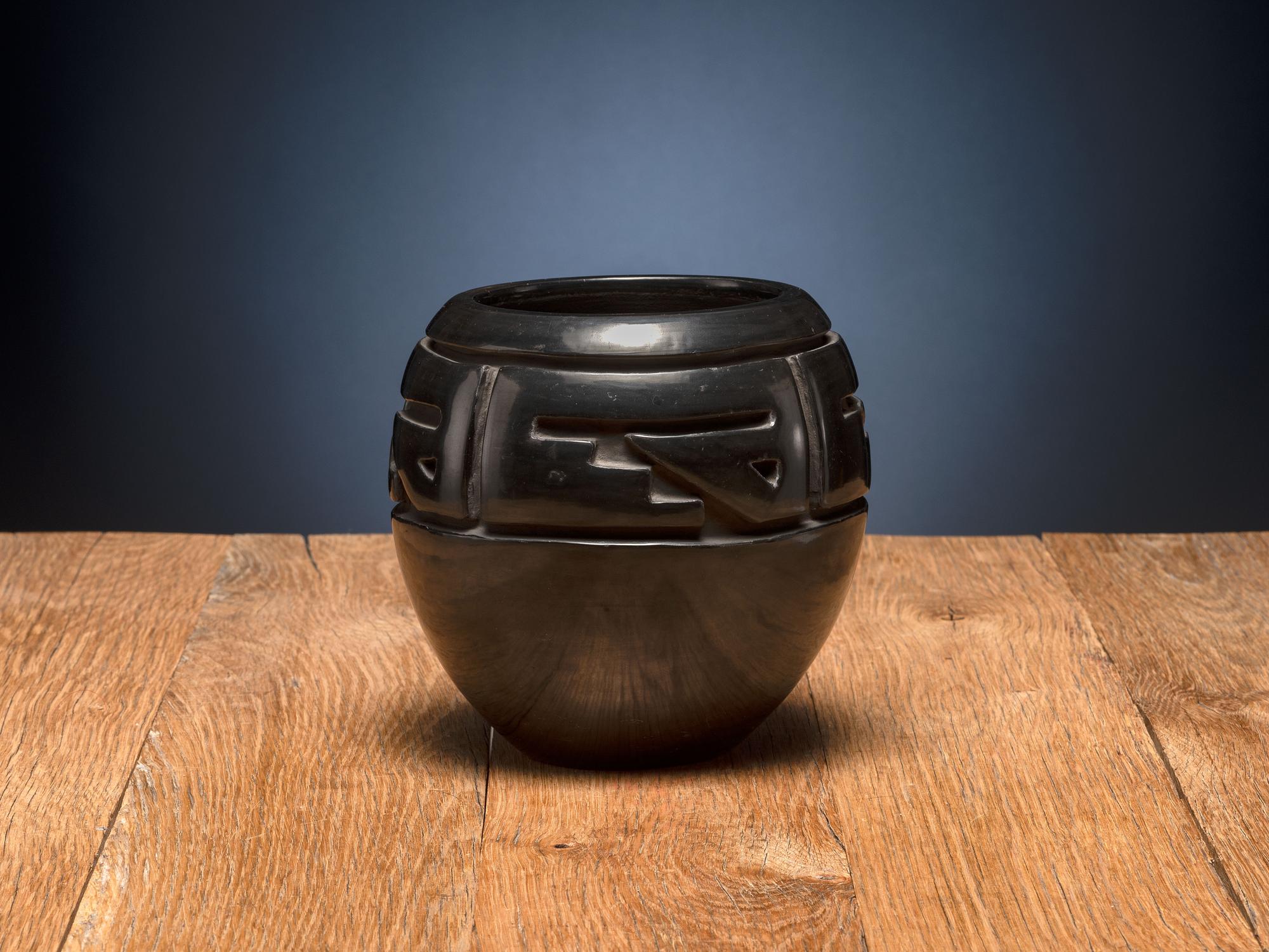 Deeply Carved Blackware Pottery Jar