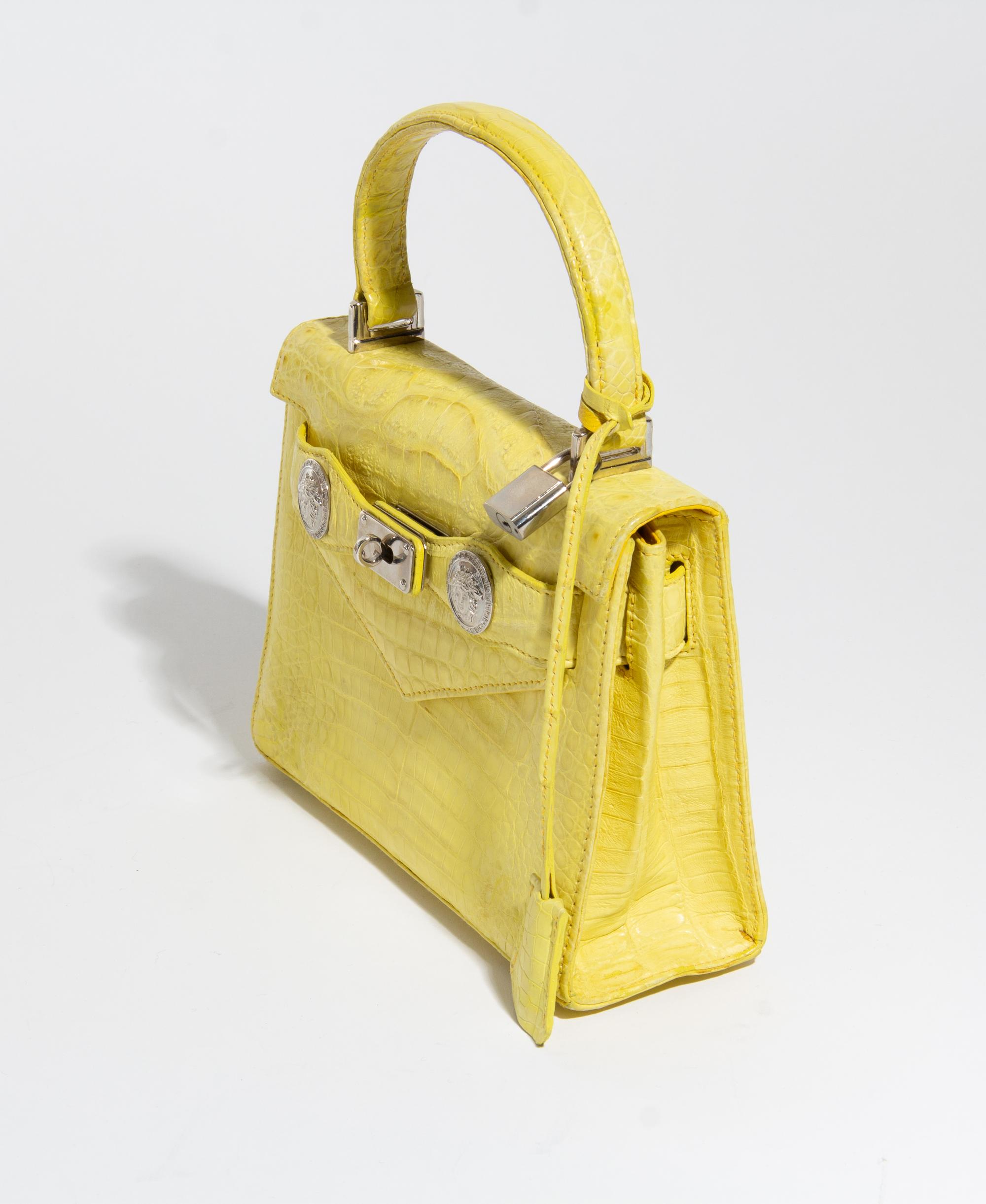 A Gianni Versace Yellow Crocodile Handbag, 7.75" x 5.5" x 2.5"; Handle drop: 3".