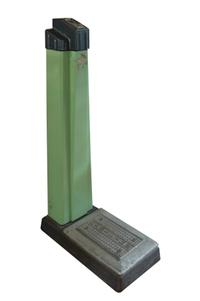 An Art Deco Stand-Up Scale 11" W x 21.5" D x 40.5" H — United States, Circa 1920
