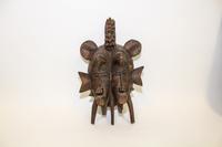 A Carved African Double Mask Height 13 1/2 inches. — MID TO LATE 20TH CENTURY