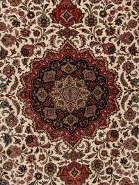 A Tabriz Wool Rug